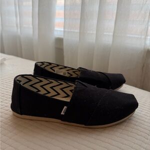 Toms Black Canvas Slip-Ons